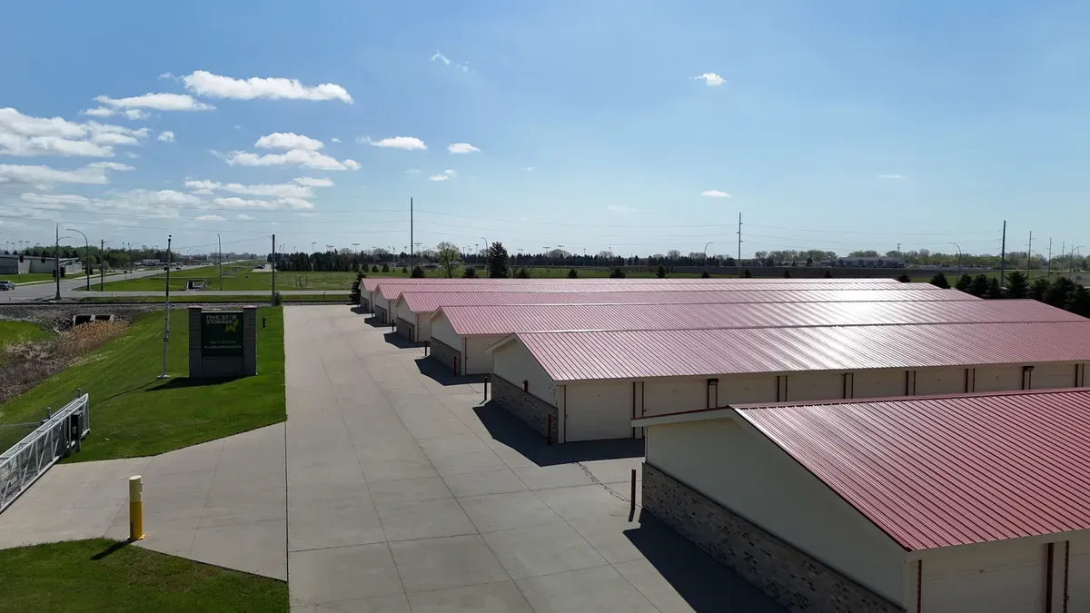 Aerial view of facility with drive up units